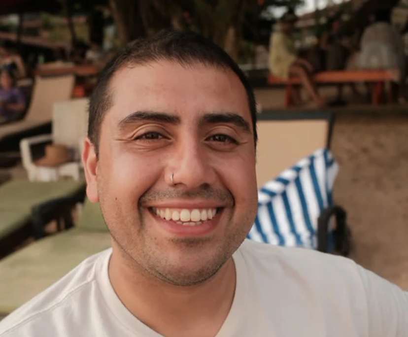 Carlos (31), $300, LGBTQIA+, Non-smoker, No pets, and No children