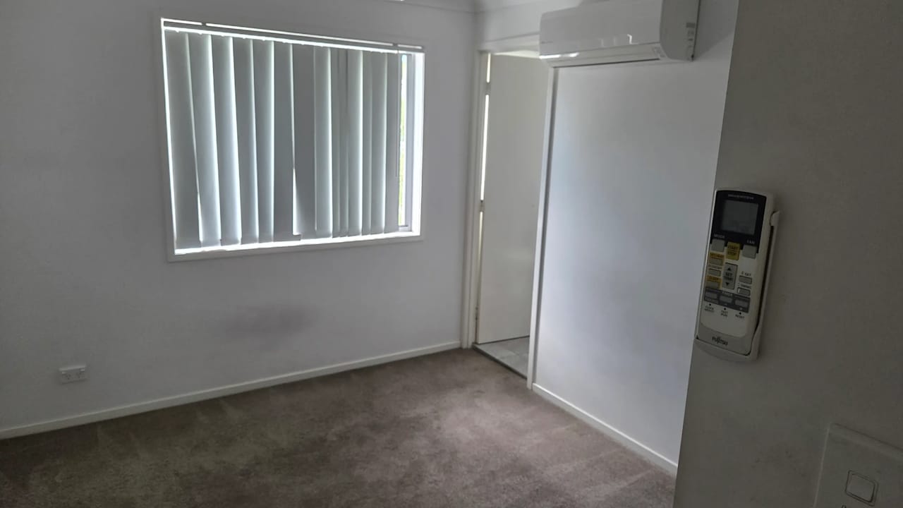 Unfurnished room with ensuite in a share house